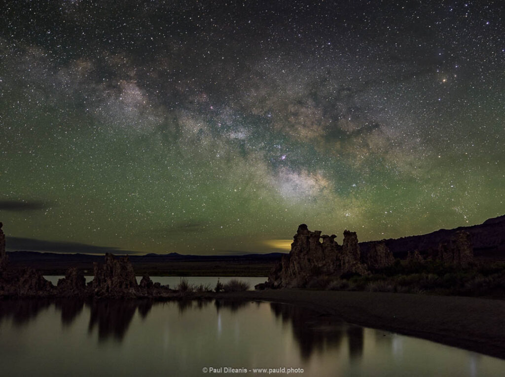 Milky Way reflected in water.